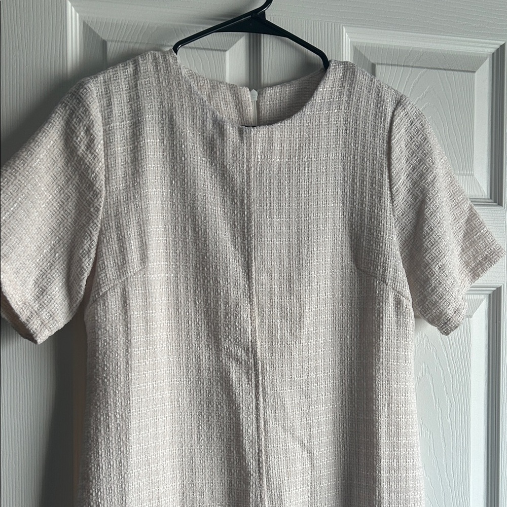 Elegant Cream Short Sleeve Dress with Fringe Hem - Picture 14 of 16